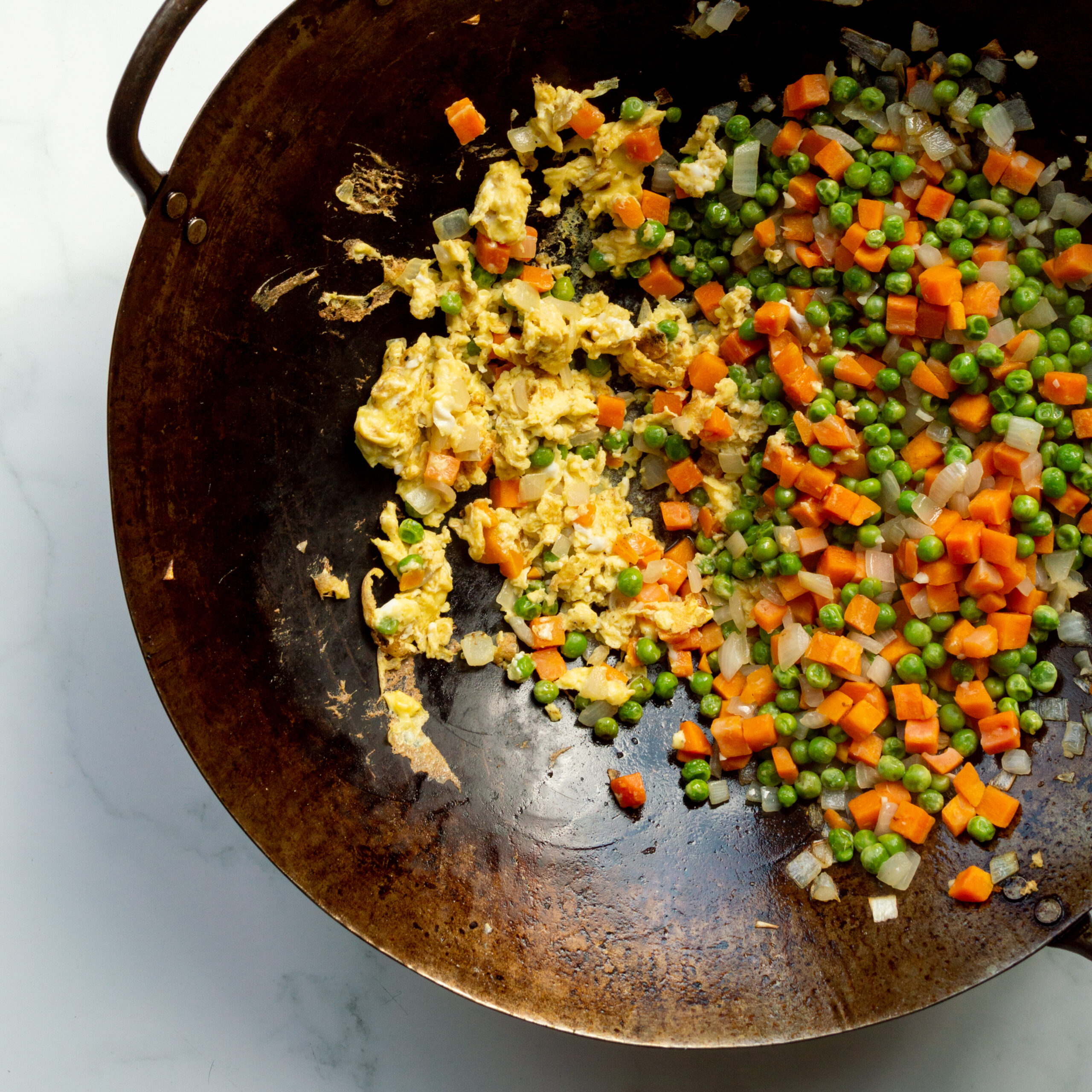 Add the frozen mixed vegetables to the skillet and cook for 3-4 minutes until they're heated through and slightly tender